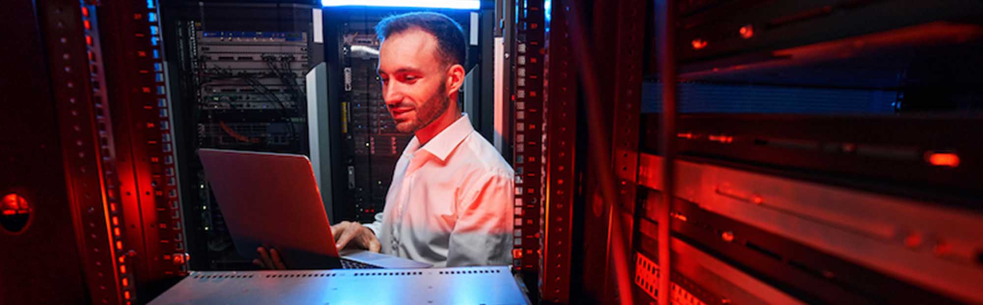 panoramic-shot-of-handyman-working-near-sink-in-kitchen-1_0003_data-center-system-administrator-checking-server-s-2023-1