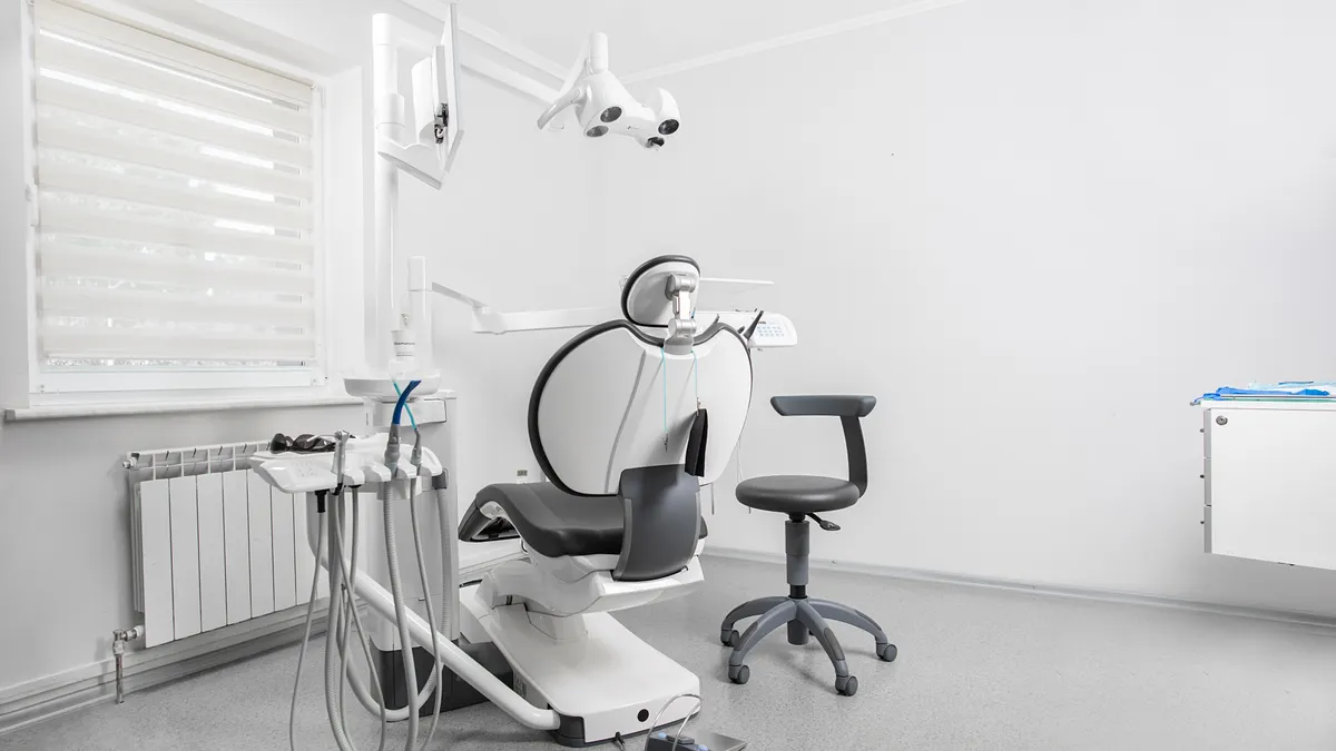 Empty dental surgery with a treatment chair, illustrating IT support for medical practices