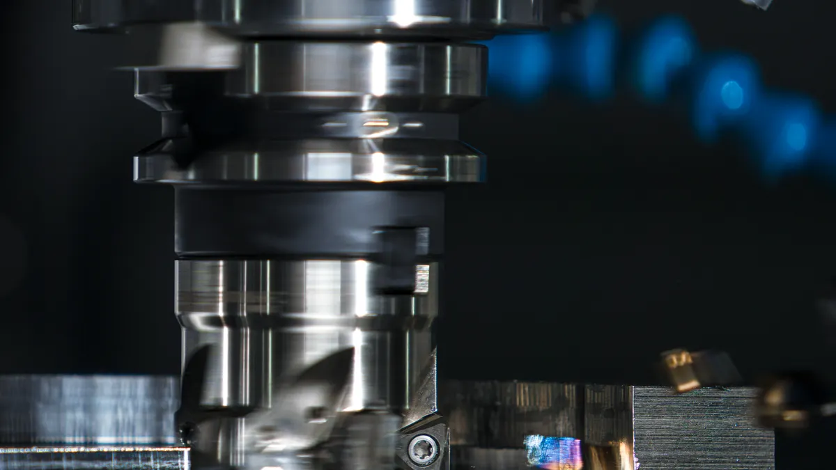 Legacy production PCs: close-up of a CNC milling cutter working on a metal block