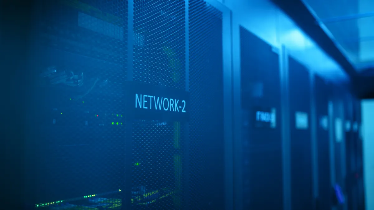 Server or cloud for accountants: a row of server racks lit in blue, with one labelled Network-2